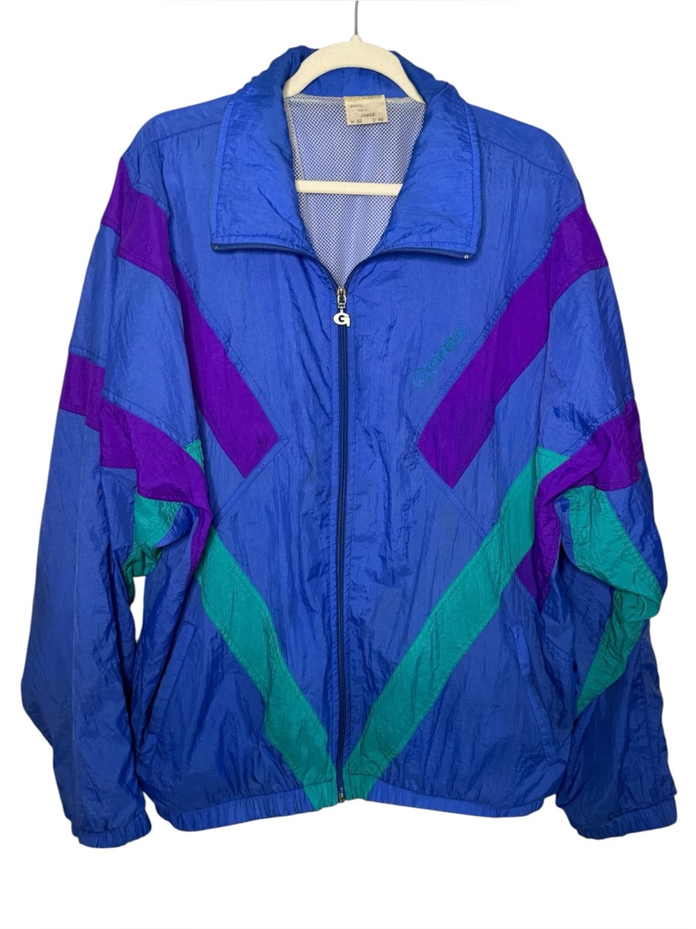 Vintage 90s blue, purple, and green geometric colorblock nylon windbreaker Sz L